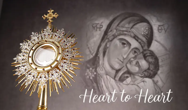 A monstrance with the image of the Holy Mother with Jesus.